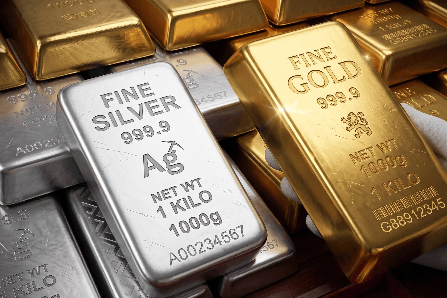 「FINE SILVER 999.9」と「FINE GOLD 999.9」の刻印が入った金と銀の地金(インゴット)